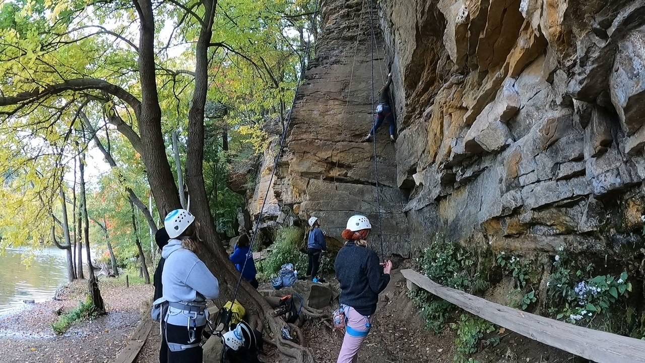 Group of students top roping at Grand Ledge